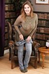 Hot babe Lottii Rose reveals her nice juggs and poses topless in green nylons