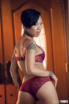 Tattooed super hot ebony Honey Gold naked and spreading pussy lips wide open