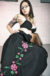 Glasses clad Holly D with big tits drops dress & sheer panties to pose naked