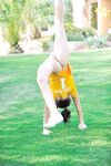 Naughty babe Tasha fists herself & sits on a cone dildo after a kinky workout