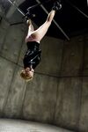 Lexi Belle gets fucked after giving a blowjob while hanging from a ceiling