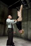 Lexi Belle gets fucked after giving a blowjob while hanging from a ceiling