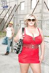 Busty blond bbw in red skirt gets caressed and kissed by a construction worker