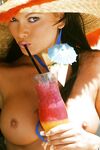 Busty Playboy centerfolds enjoy warming their big tits in the Australian sun