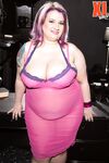 Obese female Porsche Dali releases her saggy boobs from sheer attire and bra