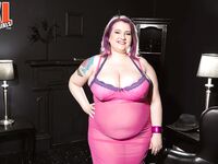 Obese female Porsche Dali releases her saggy boobs from sheer attire and bra