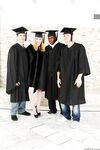 Blonde grad in heels spreads to flash nude upskirt in interracial group grope