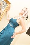 Blonde princess Paige F strips and poses in pantyhose in front of the mirror