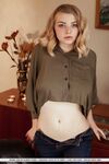 Young solo girl Daniel Sea uncovers her nice tits and shaved pussy