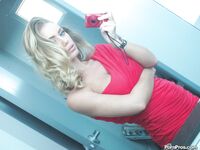 Ravishing blonde babe Nicole Aniston uncovering her gorgeous body