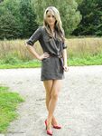 Hot blonde in high heel pumps flaunting her sexy legs and feet outdoors