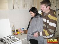 Teen lovers engage in a hard couples fuck in the kitchen