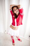 Cute brunette cheerleader flashing young tits and ass in sports socks