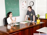 Latina MILF teacher Isis Love fucks student on desk in stockings and heels