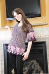 Slender cutie Michelle L spreading her amateur hairy pussy by fireplace