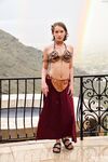 Skinny babe in Princess Leia costume Natalie rubs her clam outdoors