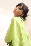 Busty brunette Domino wets her shaved pussy while toying in the bathtub
