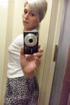 Czech lady Kathy White taking selfies in the mirror while stripping