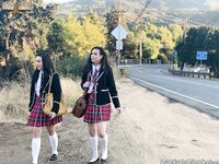 Naughty schoolgirls suck off a big black cock after consulting the Ouija board