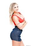 Hot blonde Alison Avery strikes great SFW poses in a denim miniskirt