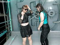Fully clothed girl dance and get soaking wet during sprinkler malfunction