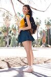 Nerdy but provocative-looking girl Yvette Nolot surprises with upskirt view