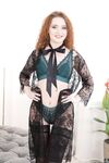 Sexy redhead Shelley Bliss posing in seductive undies and black stockings