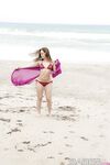 Amazing wet babe Remi showing that beautiful body on the beach