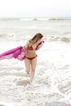 Amazing wet babe Remi showing that beautiful body on the beach