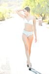 Adorable amateur Roxanna strips to hot underwear before getting nude in public