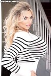 Blonde bombshell Katy Ann sets her fake tits free before baring her hot ass