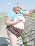 Fat old woman Grandma Libby exposes herself on a desolate bike path
