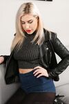 Babe Jenny James strips and shows her incredible boobs while posing in tights