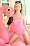 Petite teen Hannah Hays frees her tight slit from pink swimsuit