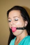 Ball gagged brunette is left all alone tied to a chair with ropes