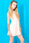 Tall thin Adriana Angel drops dress to show flat chest & diamond pussy tattoo