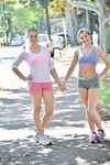 Fit lesbian girls flashing tits and ass outdoors on public street