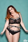 Plump British redhead Lucy Vixen flaunts her all natural phenomenal boobs