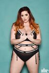 Plump British redhead Lucy Vixen flaunts her all natural phenomenal boobs