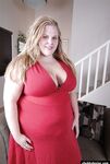 Sexy SSBBW Christina spreads her shaved vagina after stripping naked