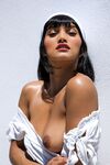 Hot babe Angel Constance strips & creams her stunning body with orange juice