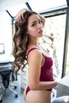 Leggy secretary Alina Lopez strips naked on top of her desk for Playboy