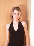 Dirty blonde model Zetta touts her bare ass after getting naked