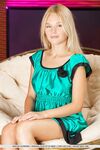 Young blonde girl Xena showcases her pussy after getting totally naked