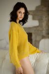 Beautiful brunette in panties Sade Mare flashes her tiny breasts on sofa