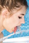 Dirty blonde teen Lady Jay wets her great tits and pink slit in the bathtub