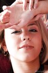 Sweet blonde teen Barbara D poses in the nude wearing just a black choker