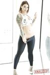 Tattooed hottie Ivy Lebelle shows her curvy body and stretches her butt