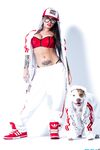 Extravagant bad girl Christy Mack poses in sexy Hip-Hop style clothing