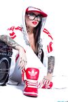 Extravagant bad girl Christy Mack poses in sexy Hip-Hop style clothing